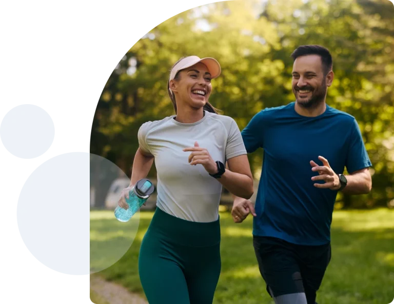Two young adults running